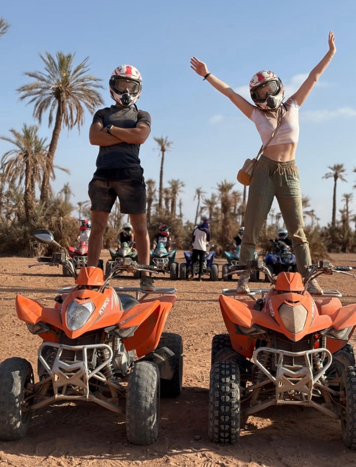 Guests riding quad bikes in Marrakech Palmeraie